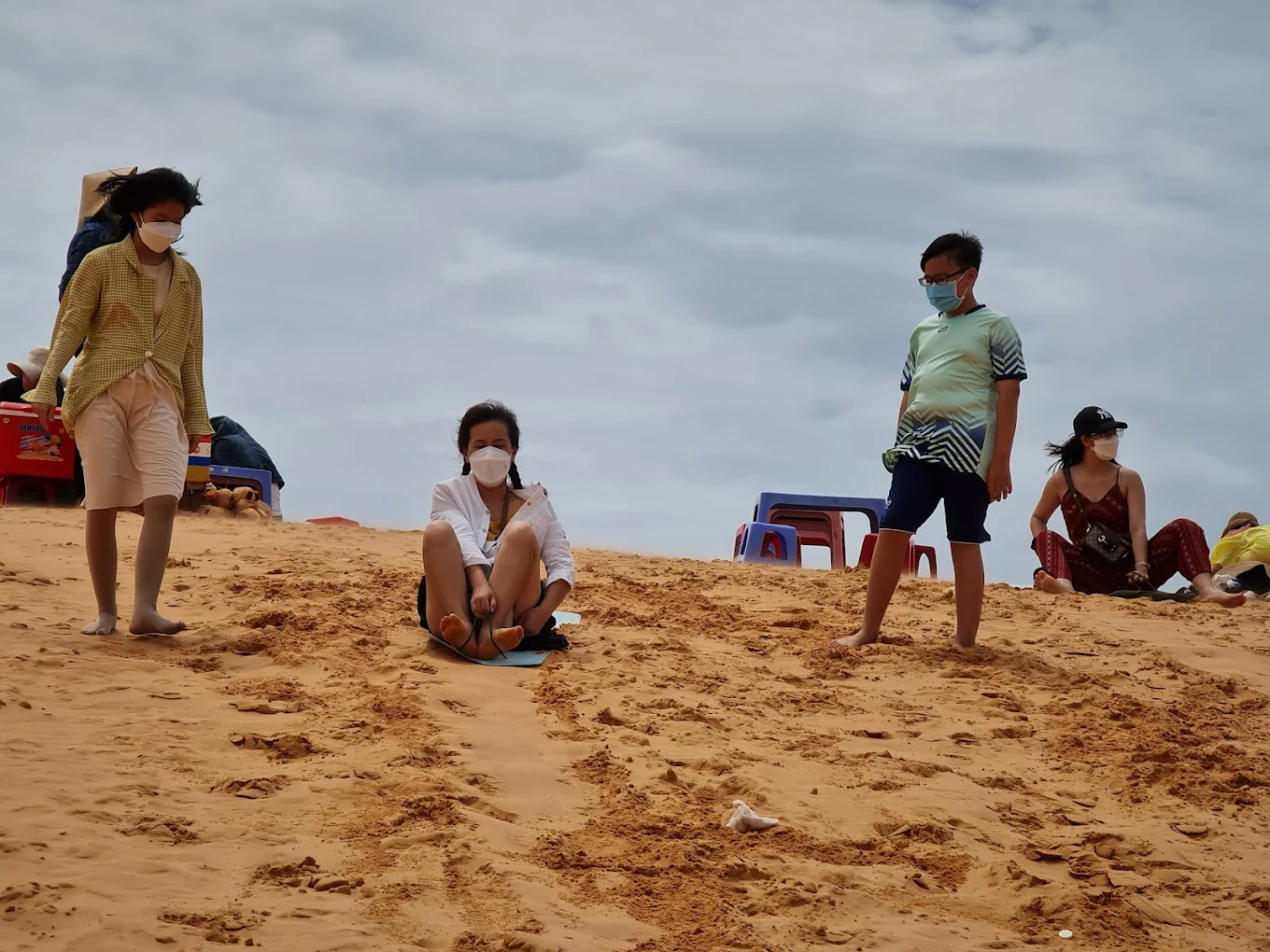 Sand Sledding at Bau Trang White Sand Dunes, Mui Ne
