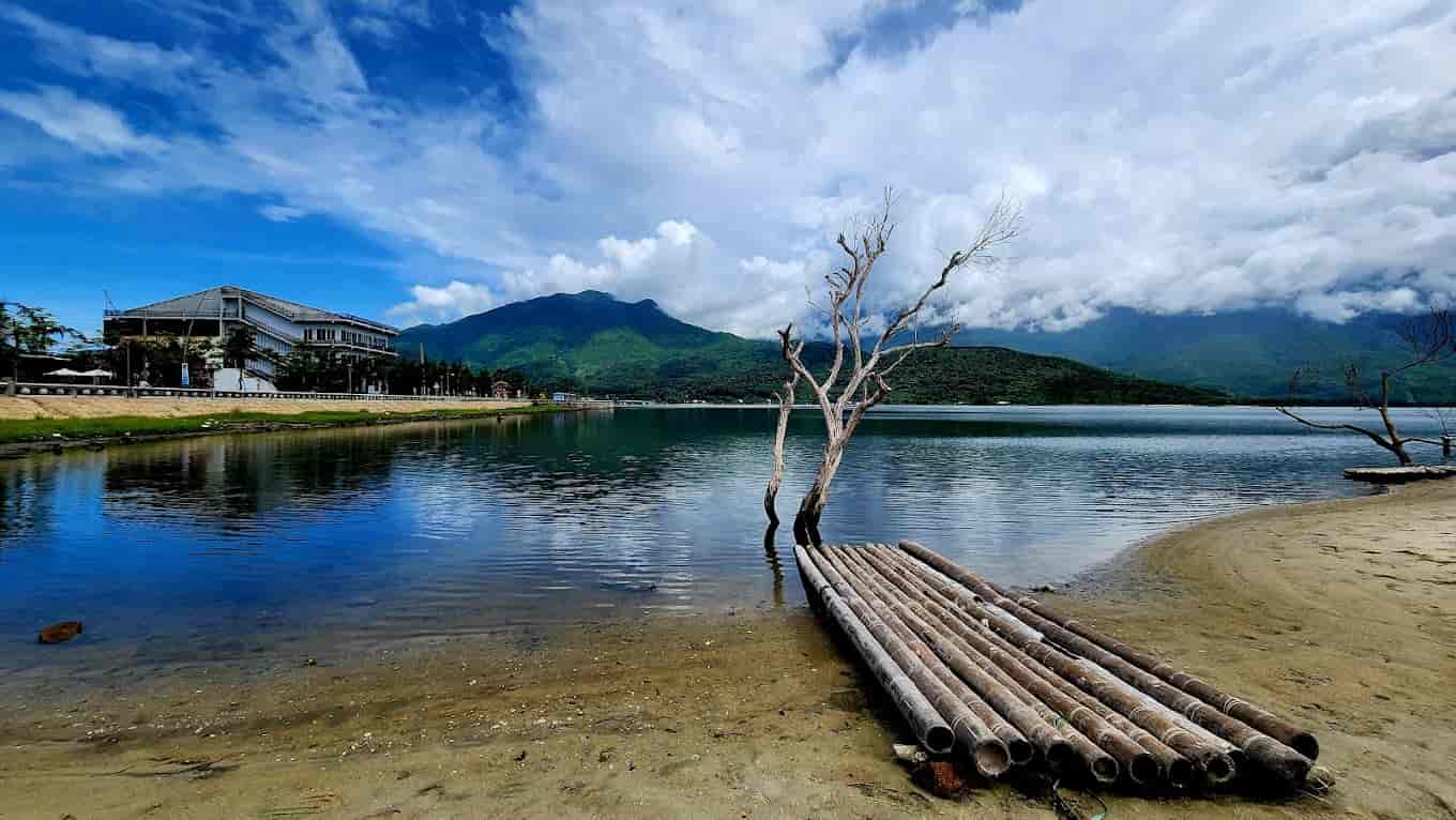 Tranquil and picturesque Lap An Lagoon with surrounding green mountains