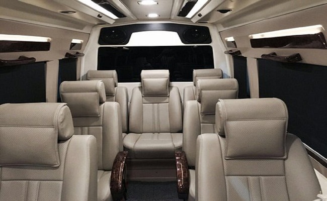 VNCarRentals.com vehicle interior with modern amenities like Wi-Fi, water, and air conditioning.