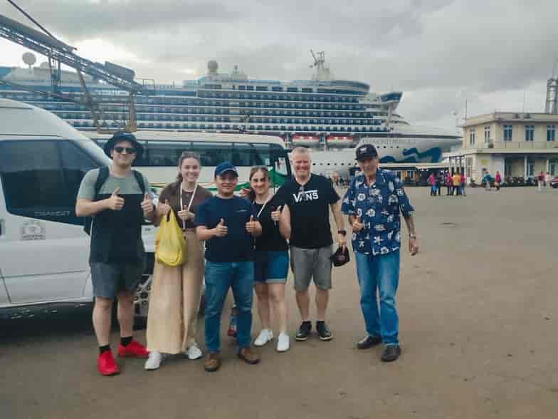 VnCarRentals.com driver welcoming guests at Tien Sa Port for a private car ride to Hoi An