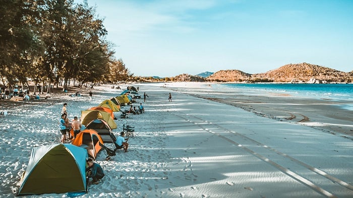 Peaceful Binh Tien Beach, a popular stop during the private car trip from Ho Chi Minh City to Cam Ranh