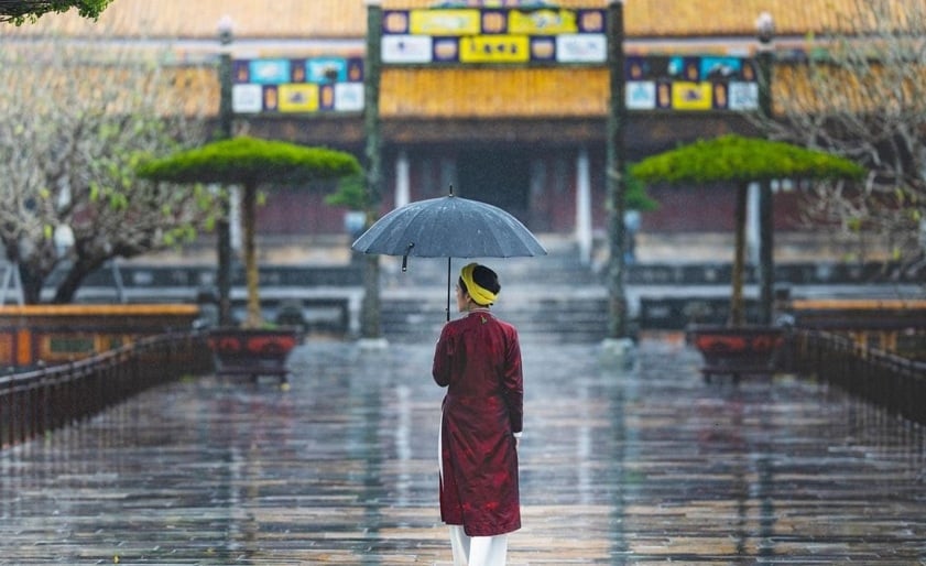 View of Khai Dinh Tomb in Hue under the rain with peaceful surroundings.