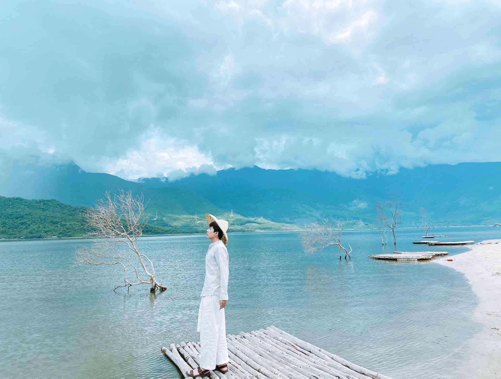 Scenic view of Lap An Lagoon with surrounding nature