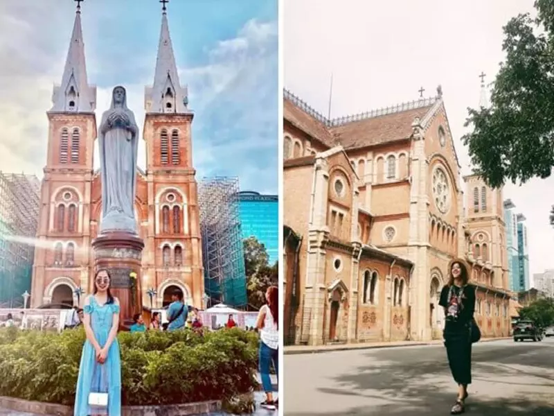 Tourists taking photos with Notre Dame Cathedral in Saigon as their backdrop.