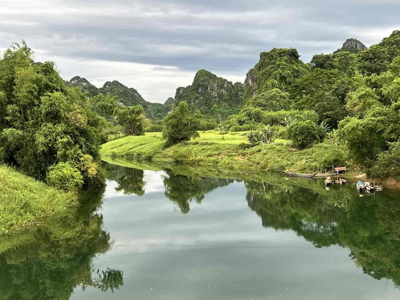 Phong Nha-Ke Bang National Park entrance with lush greenery and signage