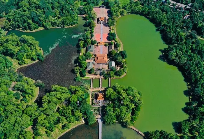 Crescent-shaped Tan Nguyet Lake at Minh Mang Tomb, symbolizing the balance and transformation of nature.