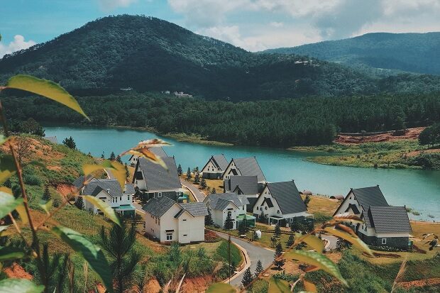 Panoramic view of Tuyen Lam Lake Da Lat with crystal-clear water and lush green pine hills