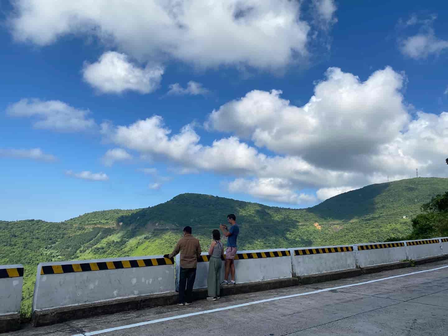 Scenic view of Hai Van Pass with winding roads and misty clouds