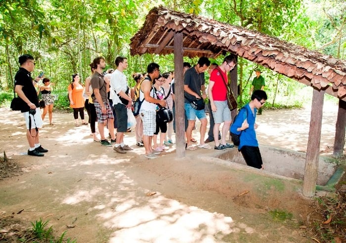 War re-enactment and historical models at Cu Chi Tunnels, famous tourist attraction